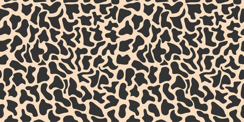 Seamless background in orange tones. Imitation leopard skin. the ideal solution for textile, backdrop, upholstery