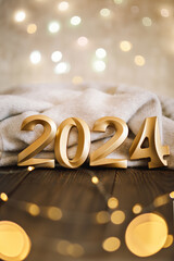 Happy New Years 2024. Christmas background with Christmas tree, cones and Christmas decorations....