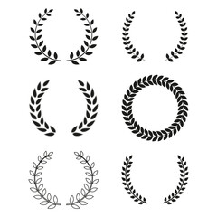 Illustration of a set of black round laurel wreaths on a white background.