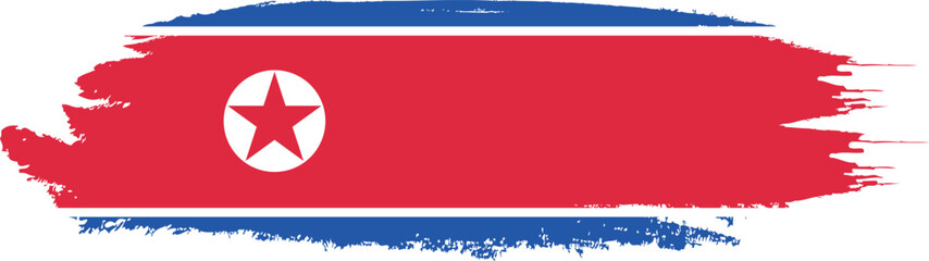 North Korea flag on brush paint stroke.