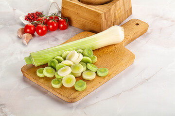 Ripe sliced leek over board