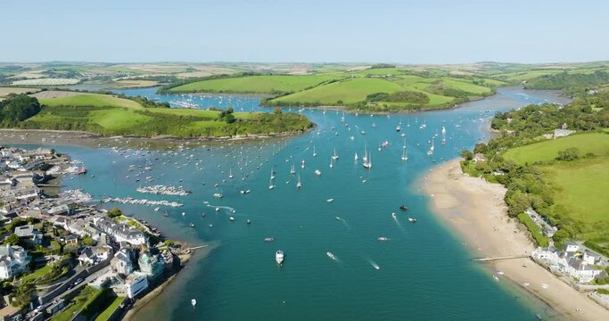 Salcombe Devon Seaside Town On Summer Day With Tourists On Holidays Boating And Families On The Beach Aerial Drone View 