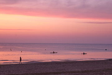 Sunrise with pink colors on the seashore