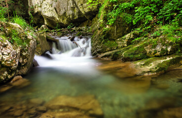 Naklejka na ściany i meble Small waterfall in stream in Gaderska dolina - Slovakia