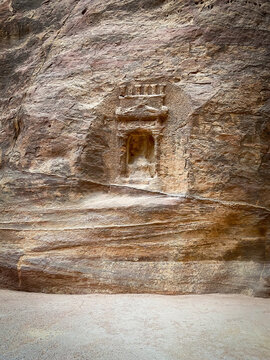 Aedicula carved into the rock along the Siq Canyon in the historic and archaeological city of Petra in Jordan