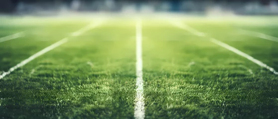 Fototapeten Closeup of Soccer field in football stadium with line grass pattern. Sport background and athletic wallpaper concept © Backdesign