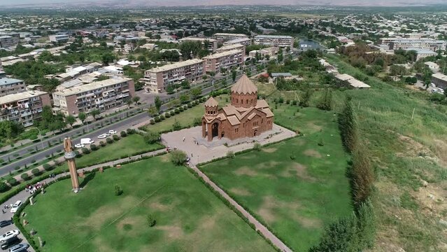 Aerial footage of Surp Hovhannes Church (St. John Church) on a sunny day in Artashat town, Armenia