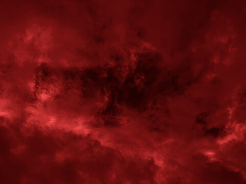Dark red smoke cloudy background. Blurred photo of dark red sky. Photo can be used for the concept of Halloween and galaxy space background.	
