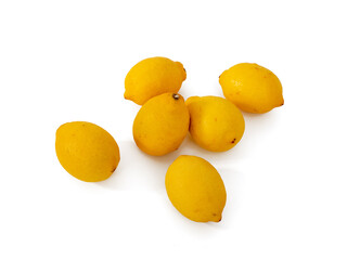 Fresh lemons on a white background. Lemon fruit close-up.
