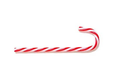 Foto op Canvas Christmas striped toy cane isolated on white background © Maya Kruchancova