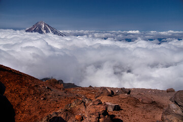 Kamchatka volcanic landscape: view to top of cone of Koryaksky Volcano from scenery active crater...