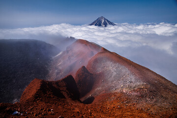 Kamchatka volcanic landscape: view to top of cone of Koryaksky Volcano from scenery active crater...