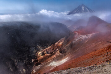 Kamchatka volcanic landscape: view to top of cone of Koryaksky Volcano from scenery active crater...