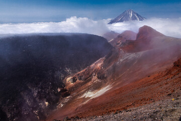 Kamchatka volcanic landscape: view to top of cone of Koryaksky Volcano from scenery active crater...