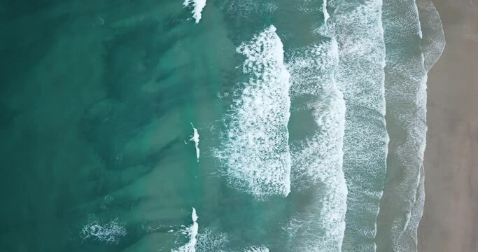 Aeria 4k drone video of waves coming into shore