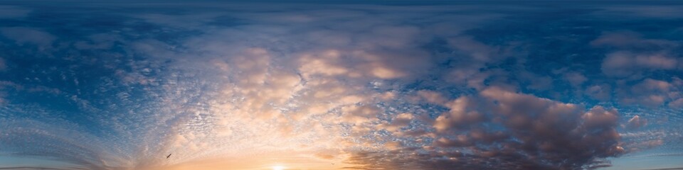Obraz premium Sunset sky panorama with bright glowing pink Cumulus clouds. HDR 360 seamless spherical panorama. Full zenith or sky dome in 3D, sky replacement for aerial drone panoramas. Climate and weather change.