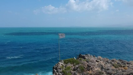 Greek flag flotting in cretan wind - Powered by Adobe