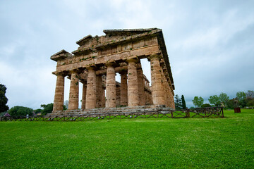 Fototapeta na wymiar Temple of Poseidon in Archaeological Park of Paestum - Italy