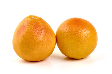 Red grapefruits, isolated on white background.