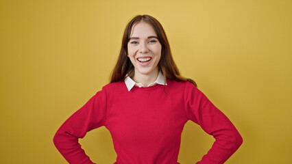 Obraz premium Young hispanic woman smiling confident standing over isolated yellow background