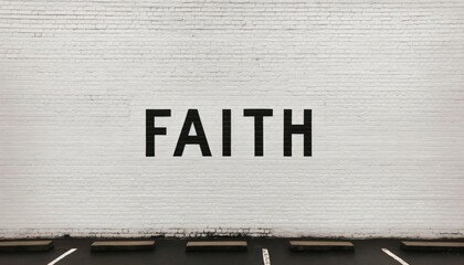 White wall in the street with the word faith in it.