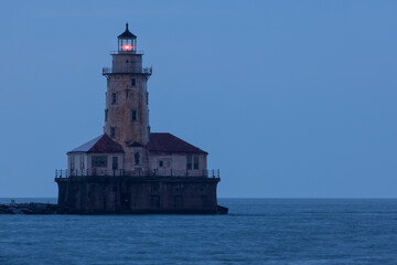Fototapeta na wymiar Chicago Harbor Lighthouse On Lake Michigan In The Evening