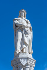 Fototapeta premium Statue of Walther von der Vogelweide in the square dedicated to him Bolzano, South Tyrol, Italy