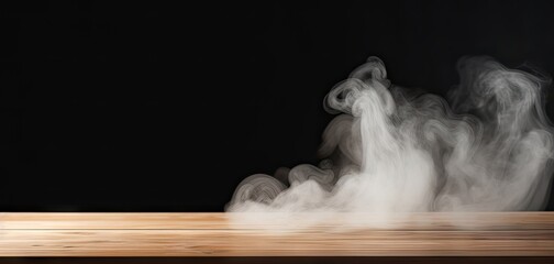 Ethereal white smoke swirls on wooden table. Abstract black background. Mysterious patterns. Nighttime effect and mist. Enigmatic studio atmosphere