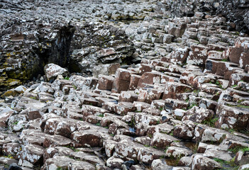 Giant's Causeway, an area of about 40,000 interlocking basalt columns in Northern Ireland - 666061313