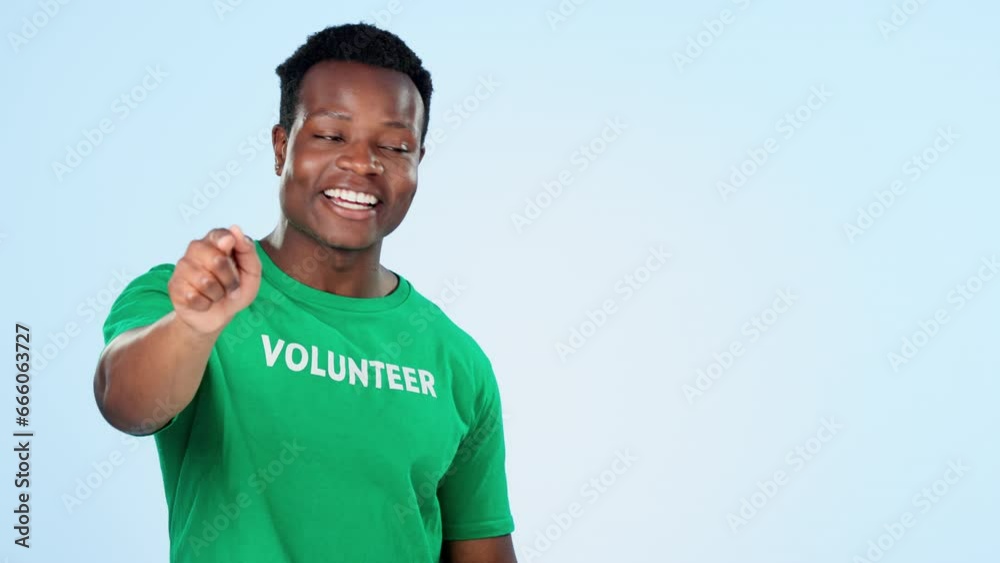 Sticker Face, volunteer and black man with promotion, pointing and presentation on a blue studio background. Portrait, African person and model with gesture, decision and choice with charity worker and ngo