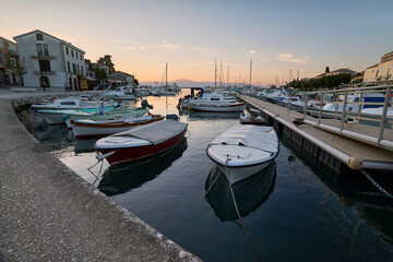 Marina with moored boats in the Croatian town of Malinska on the