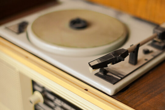 Dusty old vinyl record player. Indoor shot