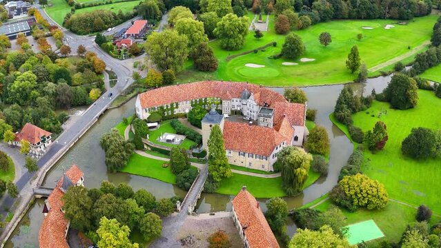 Aerial drone view water castle Wasserschloss Burgsteinfurt Steinfurt, North Rhine-Westphalia, Germany. High quality 4k footage
