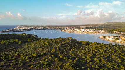 aerial drone view of the mediterranean coast at sunrise in porto colom, Majorca, balearic islands