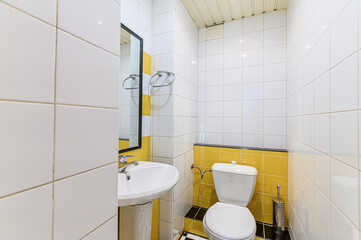 interior apartment room bathroom, sink, decorative elements, toilet