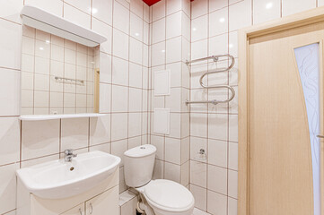 interior apartment room bathroom, sink, decorative elements, toilet