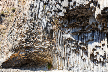 symphony of the stones - natural basalt formations in Garni gorge in Armenia on sunny autumn day