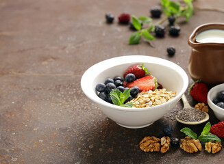 healthy eating breakfast granola with berries and chia seeds