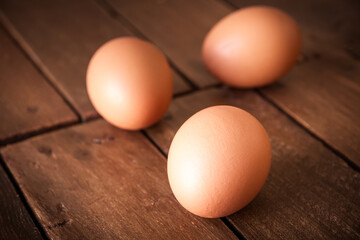 Eggs on a rustic wooden board