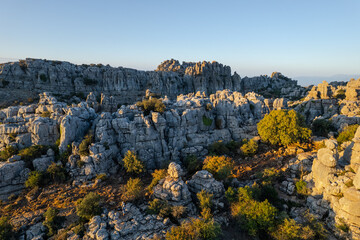 Unreal rock formation and landscape of Torcal de Antequera in Malaga, Andalusia, Spain. Aerial...