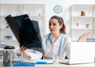 Young female doctor radiologist working in the clinic