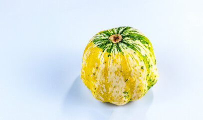 Small decorative pumpkins for Halloween on a white background,
