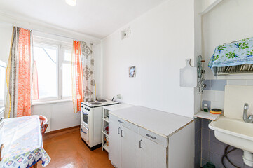 interior apartment kitchen and dining room, refectory area, cooking equipment, table furniture, stove