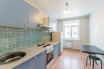 interior apartment kitchen and dining room, refectory area, cooking equipment, table furniture, stove