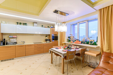 interior apartment kitchen and dining room, refectory area, cooking equipment, table furniture, stove