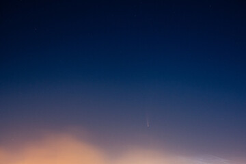 Comet Neowise and noctilucent clouds visible in the sky