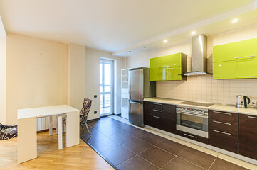 interior apartment kitchen and dining room, refectory area, cooking equipment, table furniture, stove