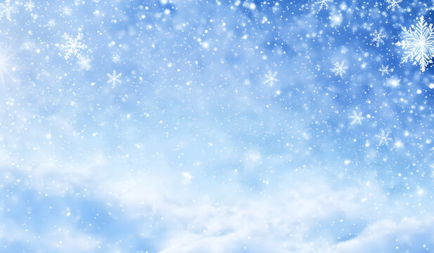 Winter background with snowflakes and bokeh lights. Christmas background.