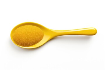A yellow spoon filled with uniform yellow spheres on a white background.