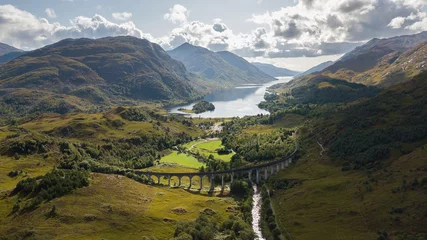 Papier Peint photo autocollant Viaduc de Glenfinnan Thanks to the Harry Potter series is this place famous than ever. Glenfinnan Viaduct is one of the most visited landmark in Scotland. This old train bridge lies in scottish highlands.